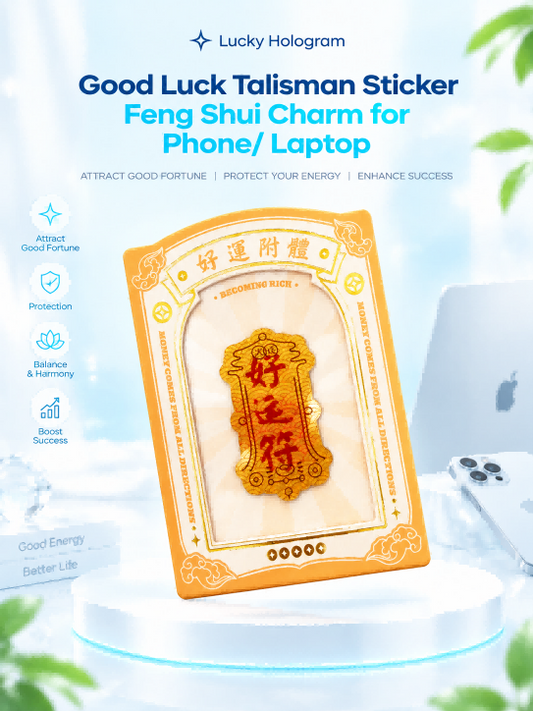 Real-image levitation long Taoist Fulu strip shape 3D floating sticker in gold laser foil with red calligraphy casting an optical shadow on a phone case.